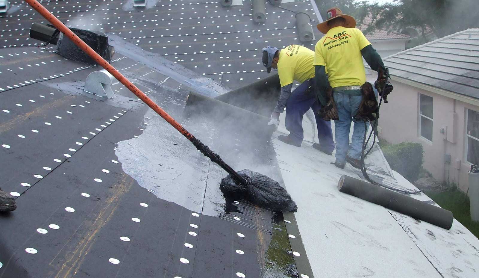 The ABC Roofing crew working on a residential project
